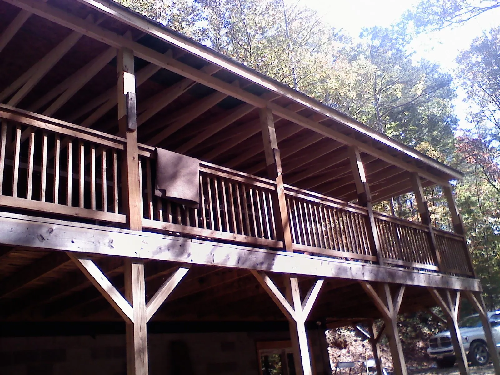 Timber framing under a new elevated porch and deck — Roof Leak Repair in Gillette by Roofing Brothers